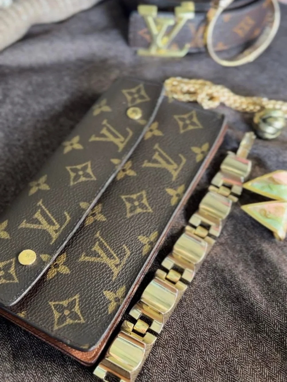 Louis Vuitton Monogram Canvas Accordion Clutch in Brown with Gold Accents